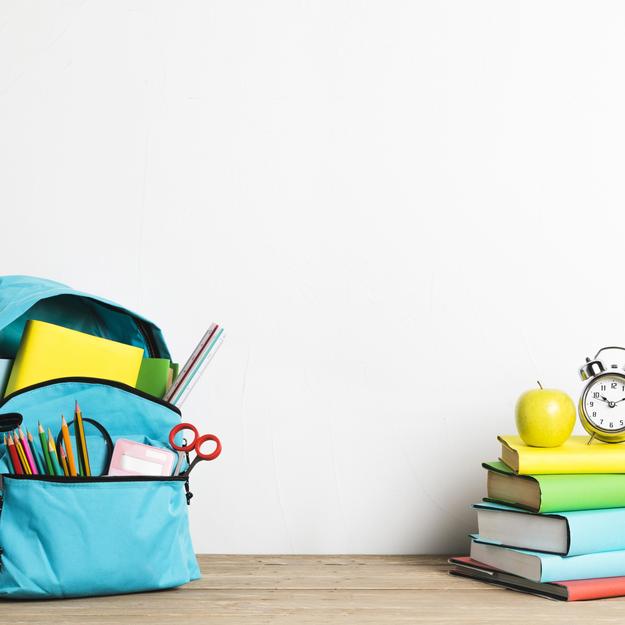 alarm-clock-stack-books-well-packed-school-bag-with-supplies_resized_cropped